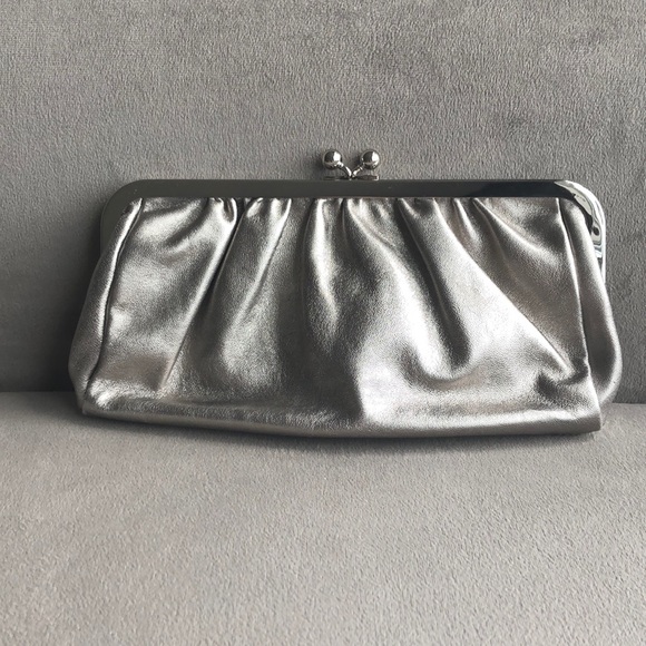 Express genuine leather metallic clutch